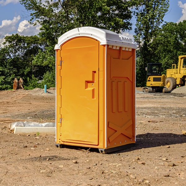 what is the cost difference between standard and deluxe portable restroom rentals in Dow City Iowa